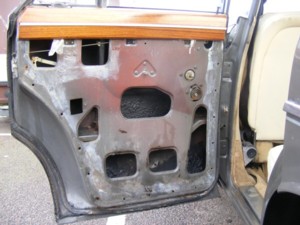 Rover p5b door with door card removed to repair lock.